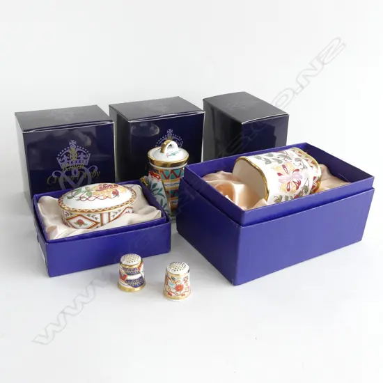 Two Royal Crown Derby thimbles, mini churn, pill box and a brush pot